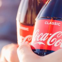 The Coca-Cola Company's Sweet Success: Earnings Soar as Volume Thrives Despite Price Hikes