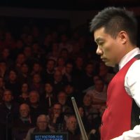 "Fashion Fumble at English Open: Ding Junhui's Wardrobe Malfunction Costs Him the Opening Frame"