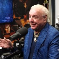 "Ric Flair Douses Finebaum Drama: Spilling More Than Liquor, Reserving Front Row Seats for the Clash in Flair Country!"