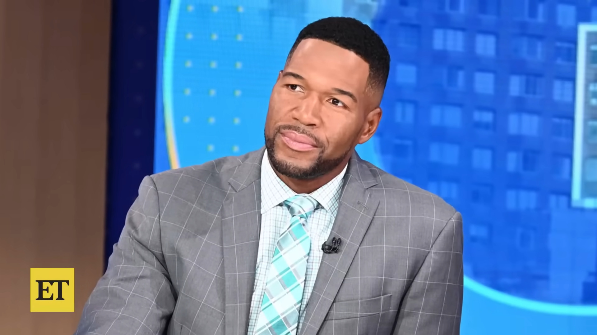 "Strahan's Morning Pause: Michael Takes a Timeout Amid Family Matters"